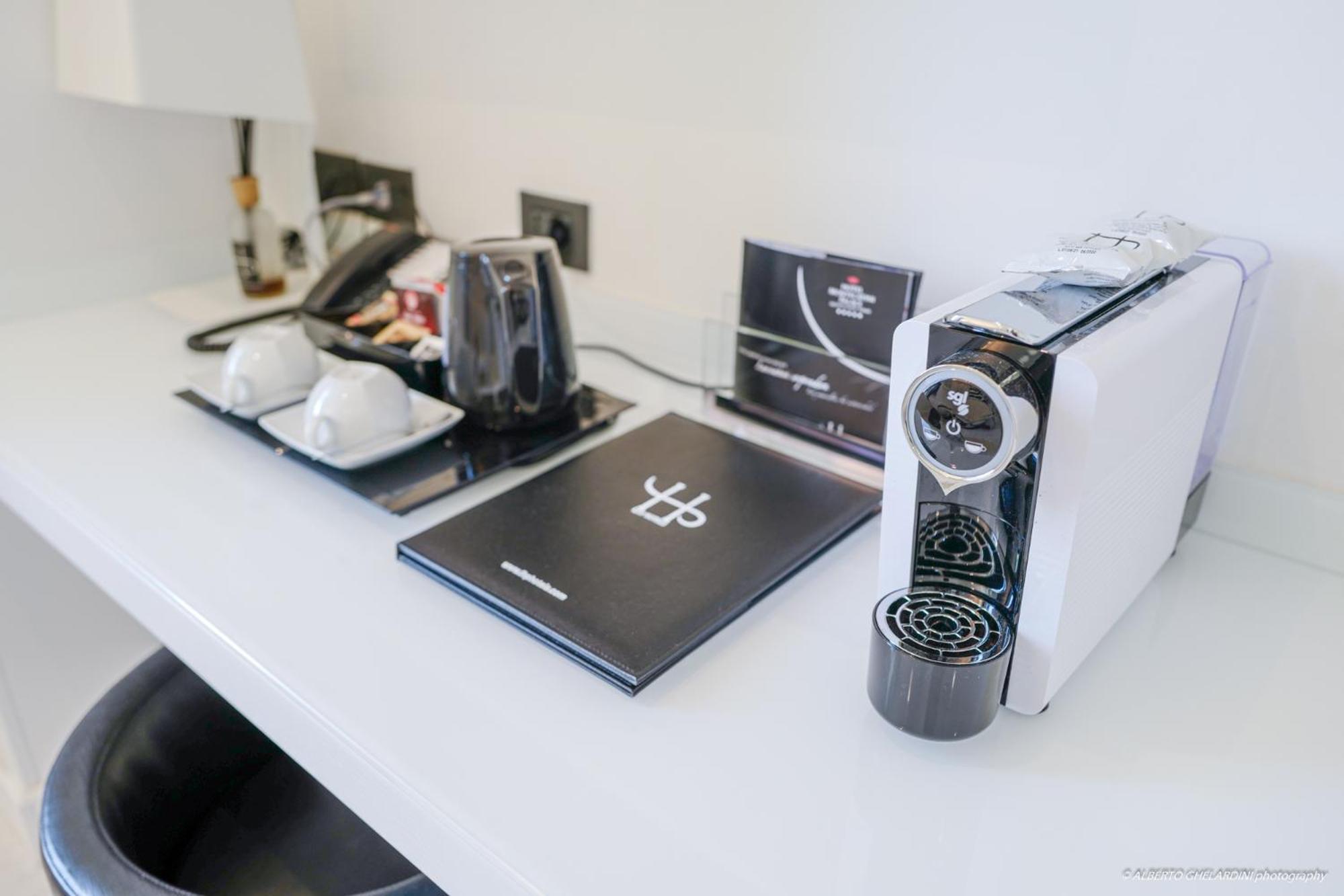 Lhp Hotel Montecatini Palace & Spa Exterior photo A Nespresso coffee machine in a hotel room